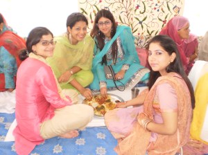 Cross-legged attack on Wazwan. Our quick mid-kebab pose for the camera.